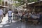 Diners and drinkers in a crowded bar in Heraklion, Crete, Greece.