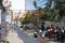 Diners enjoy their meals at a cafe adjacent to the bustling Talpiot market