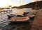 Dinghies tied to a dock for happy hour in the caribbean