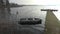 Dinghy inflatable boat in the water at a jetty in a northern German lake