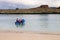 Dinghy motoring from the beach of Chinese Hat island, Galapagos