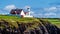 Dingle Lighthouse on a rocky cliff, Co Kerry, Ireland
