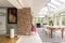 Dining area with glass roof and walls