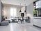 Dining room with dining table and sitting area with sofa in a modern white loft style kitchen