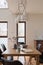 Dining room with fancy chandelier