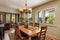 dining room with large, french shuttered windows