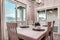 Dining room with mountain lake neighborhood and porch view through the windows