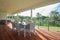 Dining room setting on the patio of modern spacious farm house d