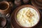 Dinner or breakfast children milk soup with pasta and cocoa powder. Rustic style