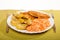 Dinner meal. Fried chicken roasted potatos and carrot salad.