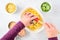 Dinner meal preparation, womanâ€™s hand mixing together ingredients for tuna noodle casserole