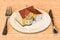 Dinner plate with house. Prepared meal delivery services, concept. 3D rendering