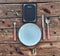 Dinner time. High angle shot of empty plate, fork, spoon, knife