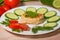 Dinner of vegetables and steak on white plate