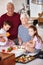 Dinner will be ready in no time. Portrait of a grandparents preparing a meal with their grandchildren.