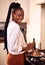 Dinner will be served soon. Cropped portrait of an attractive young woman cooking in her kitchen at home.