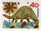 Dinosaur (brontosaurus) on a vintage post stamp