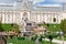 Dinosaurs park in the Palas Public Garden. Palatul Culturii or The Palace of Culture on background