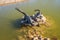 Dinosaurs statues on the pond in Geosfera park in Jaworzno