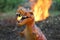 Dinosaurs Tyrannosaurus rex model running away from forest fire