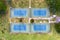 Direct overhead view of four tennis courts
