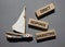 Direct Response Marketing symbol. Concept words Direct Response Marketing on wooden blocks. Beautiful grey background with boat.