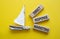 Direct Response Marketing symbol. Concept words Direct Response Marketing on wooden blocks. Beautiful yellow background with boat