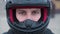 Direct view of a motorcyclist in a helmet with an open visor