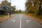 Direction arrows on paved road at intersection, choice concept