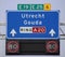 Direction and mandatory speed sign above motorway A20 heading to Gouda and Utrecht, also European way E19 and E25.