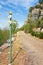 Direction sign with compass nearby the village Vogue in the Ardeche region of France