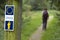 Direction sign and pilgrim on the Saint James Way