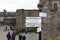 Direction signpost inside Edinburgh Castle, popular tourist attraction and landmark of Edinburgh, capital city of Scotland, UK