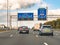 Direction signs on overhead gantry, motorway A2 at exit to A12, traffic junction Oudenrijn, Utrecht, Netherlands