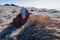 Directional path mark with Austrian flag on rock on hiking trail near Ladinger Spitze, Saualpe, Carinthia, Austria. Morning frost