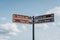 Directional sign to Prague Castle and Charles Bridge in Prague, Czech Republic.