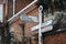 Directional signs on a street in Lavenham, Suffolk, England, UK