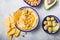 Directly above shot of Hummus or humus In bowl on table. Vegan plant based food