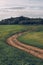 Dirt clay road in the field