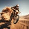 Dirt domain Motocross rider tackles desert jumps, an enduro spectacle