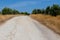 A dirt road through the agricultural fields in the outskirts of Madrid in the Valdemoro area