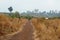 Dirt road through barren arid land