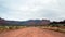 Dirt road in barren landscape of Utah