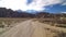 Dirt Road in Desert Aerial Shot of Sierra Nevada Mountains and Mt Whitney from Alabama Hills