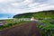 Dirt road going to the village of Vik and its lutheran church in Iceland