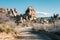 Dirt road and huge boulders in the desert, in Joshua Tree National Park, California