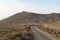 Dirt road with Montana Roja in background