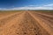A dirt road of the Oodnadatta Track in the outback of Australia