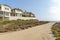 Dirt road outside the fenced beach houses at Carlsbad, California