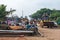 Dirt road with people sorting through rubble  Nandakeshwar  Karnataka  India